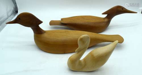 A Cherry wood carving of a bird by Norman wood together with...