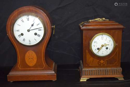 A wooden inlaid mantle clock together with another clock 34c...