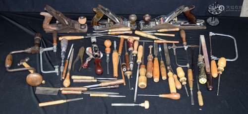 A collection of cabinet makers tools; files, planes, hammers...