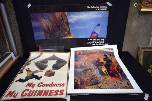 A Guinness poster together with a No fear poster and a Salva...