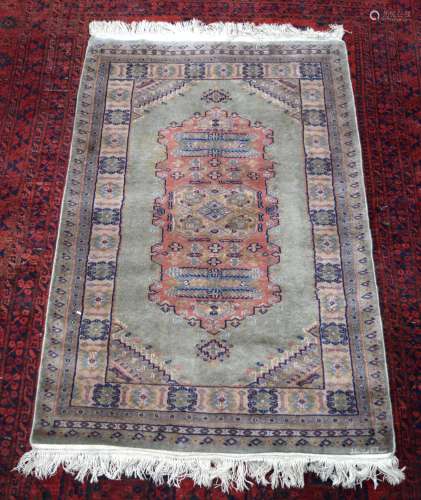 A signed Persian rug 146 x 93 cm