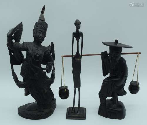 A collection of South East Asian wooden carvings together wi...
