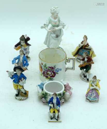 A collection of continental porcelain figures Napkin rings, ...