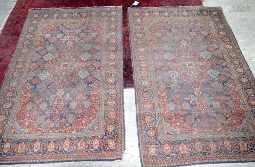 A pair of large Persian rugs 218 x 135 cm