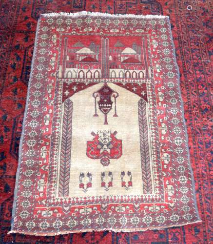 An Islamic Prayer rug 113 x 76 cm