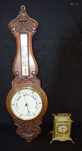 A Mid Century Wooden Barometer together with a metal Chinese...