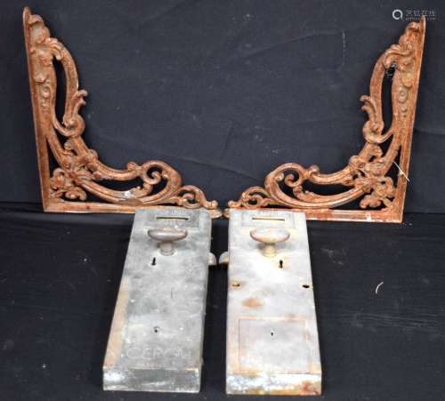 A pair of vintage brass penny slot Cero toilet door locks to...