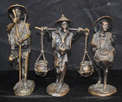 A group of three bronze South East Asian figures of males 25...