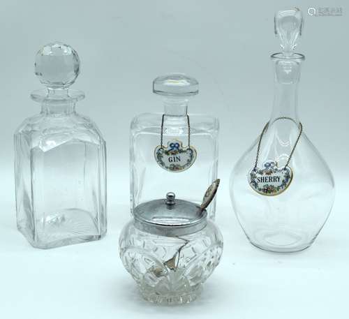 A Kosta Boda glass decanter together with two other decanter...