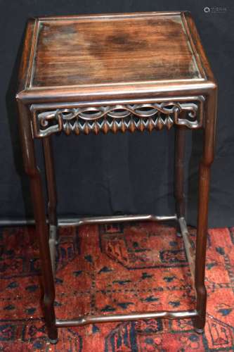 A Chinese hardwood stand 66 x 41 cm.