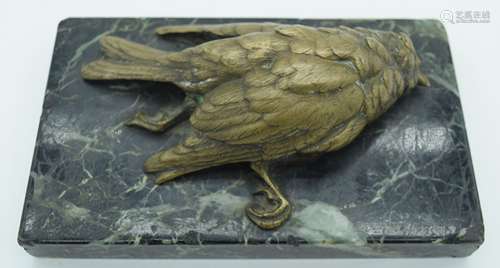 A small bronze bird by Jules Moigniez mounted on a marble pl...