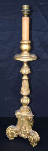 An antique large gilded plaster and wood candlestick convert...