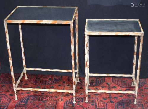 A nest of two painted metal side tables with mirrored tops. ...