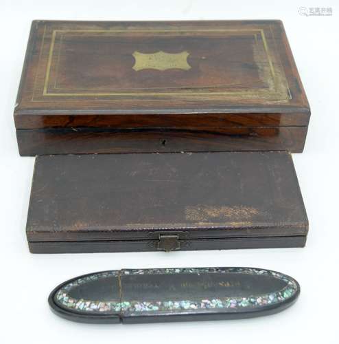 A cased drawing set together with a cased bone handled tool ...