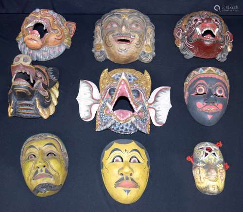 A collection of South eastern Asian masks (9).