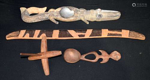 An African wooden crocodile together with a group of African...