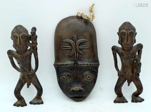 A pair of African Tribal bronze figures together with a pott...