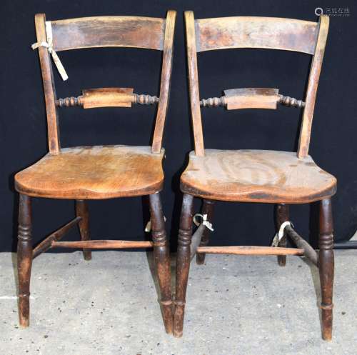 A pair of wooden scroll back Windsor chairs 82 x 42cm x 44cm...