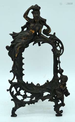 A metal classical form photo frame 36 x 18cm.