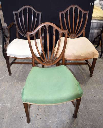 A set of three wooden upholstered dining chairs 90 x 57 x 61...