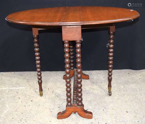 A small Victorian bobbin turned gateleg table 62 x 84cm.