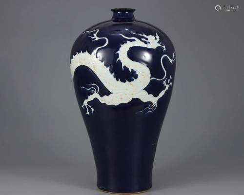 A Blue and White Reserve Decorated Dragon Vase Qing