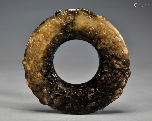 A Carved Jade Disc Bi Han Dynasty