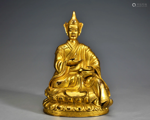 A Tibetan Gilt Bronze Seated Guru