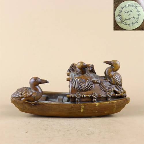 A Carved Hardwood Boat Shaped Decoration