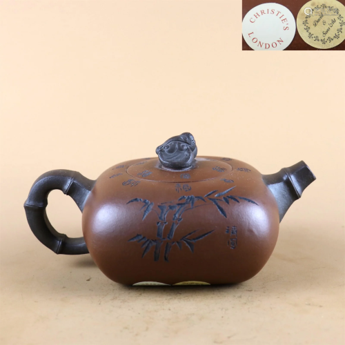 A Carved Yixing Zisha Teapot