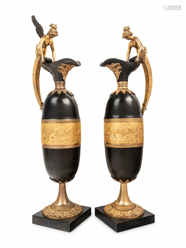 A Pair of Continental Gilt and Patinated Bronze Ewers