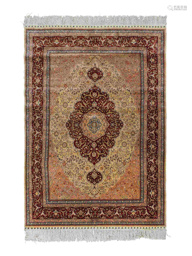 A Signed Tabriz Silk Rug