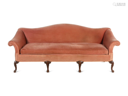 A George III Style Carved Mahogany Camel Back Sofa