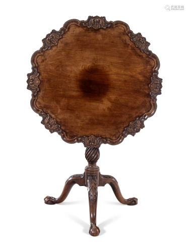 A George III Carved Mahogany Tilt-Top Table