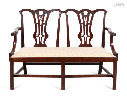 A George III Style Carved Mahogany Double-Back Settee