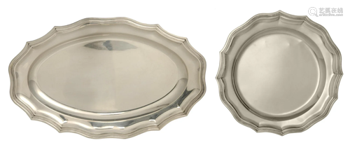 A round and an oval silver serving plate, Ã˜ 39,5 cm -