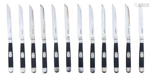 A fine set of 12 silver fruit knives by 'Currat,