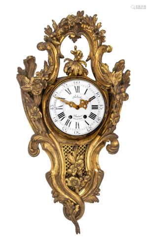A Rococo style gilt bronze cartel clock, marked