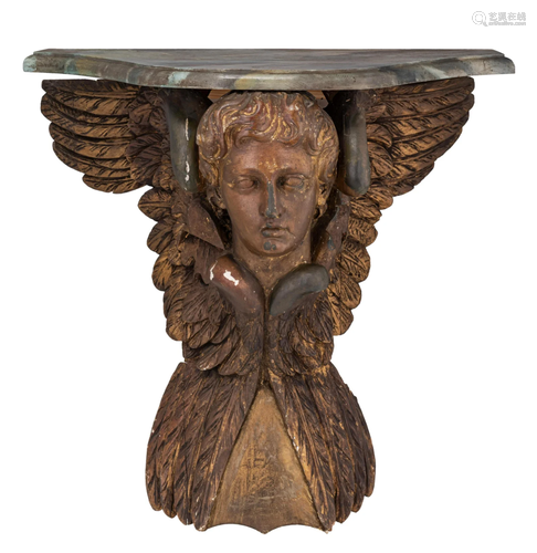 An Empire style console table, with a carved winged