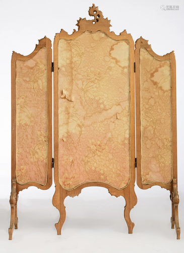 A Rococo style fire screen, with a romantic scene in