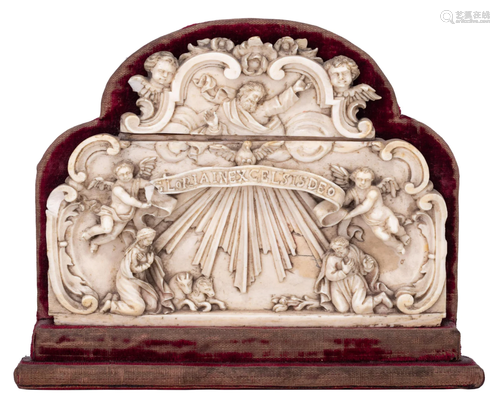 A 17th/18thC ivory group depicting the Nativity of