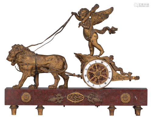 An Empire style mantle clock, with on top Cupid's
