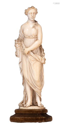 A 19thC Paris ivory Flora figure, H 17,8 cm - 20,1cm