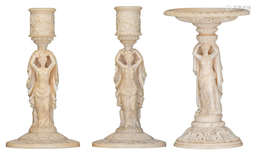 A pair of 19thC Dieppe or Paris ivory candlesticks and