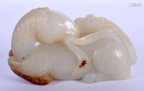 AN 18TH/19TH CENTURY CHINESE CARVED JADE FIGURE OF A HORSE m...
