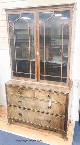 A George III style banded mahogany cabinet on chest, length ...