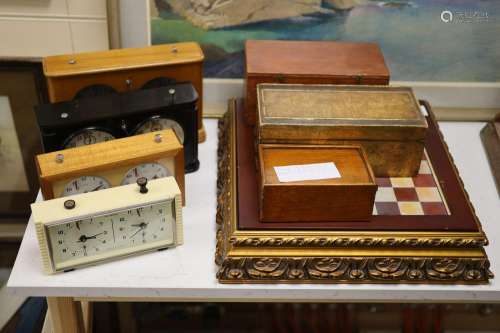 Four chess sets and four chess clocks