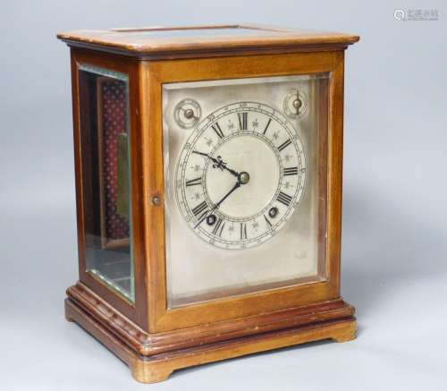 A chiming 4 glass mahogany mantel clock, retailed by Birch a...