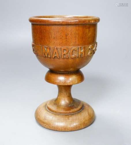 A turned and carved wood goblet made from the timber of the ...