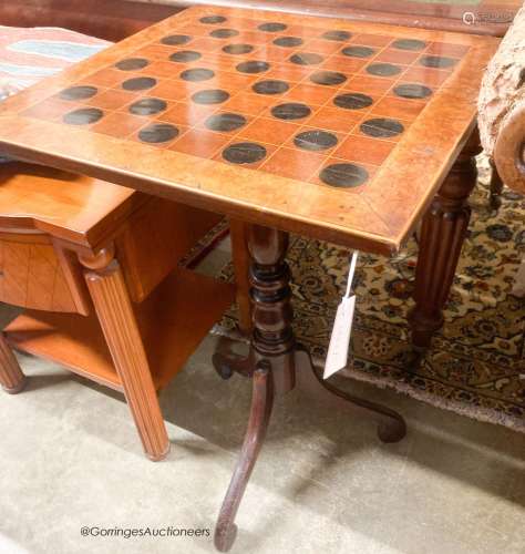An early 19th century mahogany games top tripod table, width...